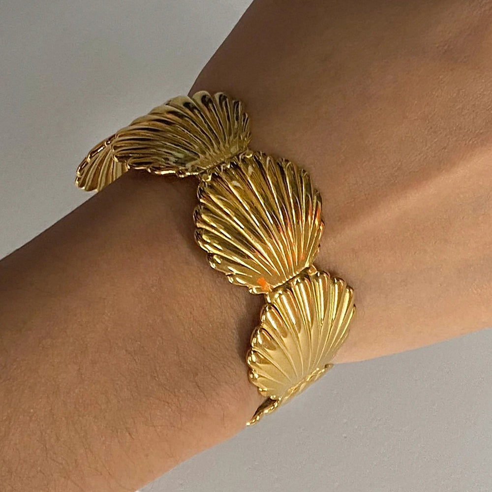 Pulseira Concha Dourada Uworld - Elegância Oceânica